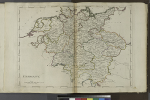 Ein aufgeschlagenes Buch mit einer detaillierten Karte von Deutschland und seinen Bundesländern und Städten.