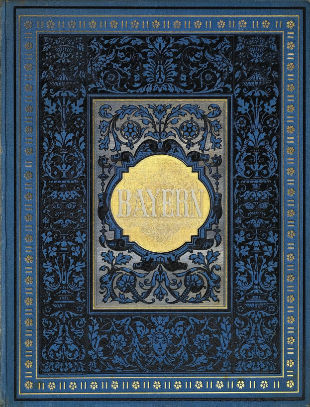 Ein blau-goldenes Buch mit dem Wort "Bayern" auf dem Cover, das mit detaillierten dekorativen Designs verziert ist.